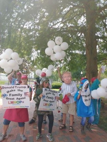 Pro-Trump presentation by Public Advocate featuring LMNOP Team, Trump masks, and LMNOP signs #Trump #TrumpAcceptanceSpeech #RNC #TrumpBalloon