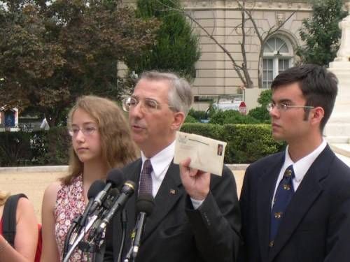 Eugene Delgaudio holds up Public Advocate's original
mailing supporting John Roberts.  It has since been
revealed Roberts worked to overturn the will of the
people in Colorado by preparing a legal brief for a
gay rights group invalidating a state constitutional
amendment upholding family values. 