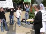 Self-proclaimed "lesbian bride and grooms"  protest Public Advocate traditional marriage celebration.