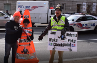 At the Justice Department DOJ protesting the Biden's Mandates and promoting the Defeat the Mandate March by handing out "Wuhan Woke Poke" pens to prolife marchers.