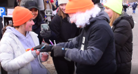 At the March for Life 2022 and the Justice Department DOJ protesting the Biden's Mandates and promoting the Defeat the Mandate March by handing out "Wuhan Woke Poke" pens to prolife marchers.